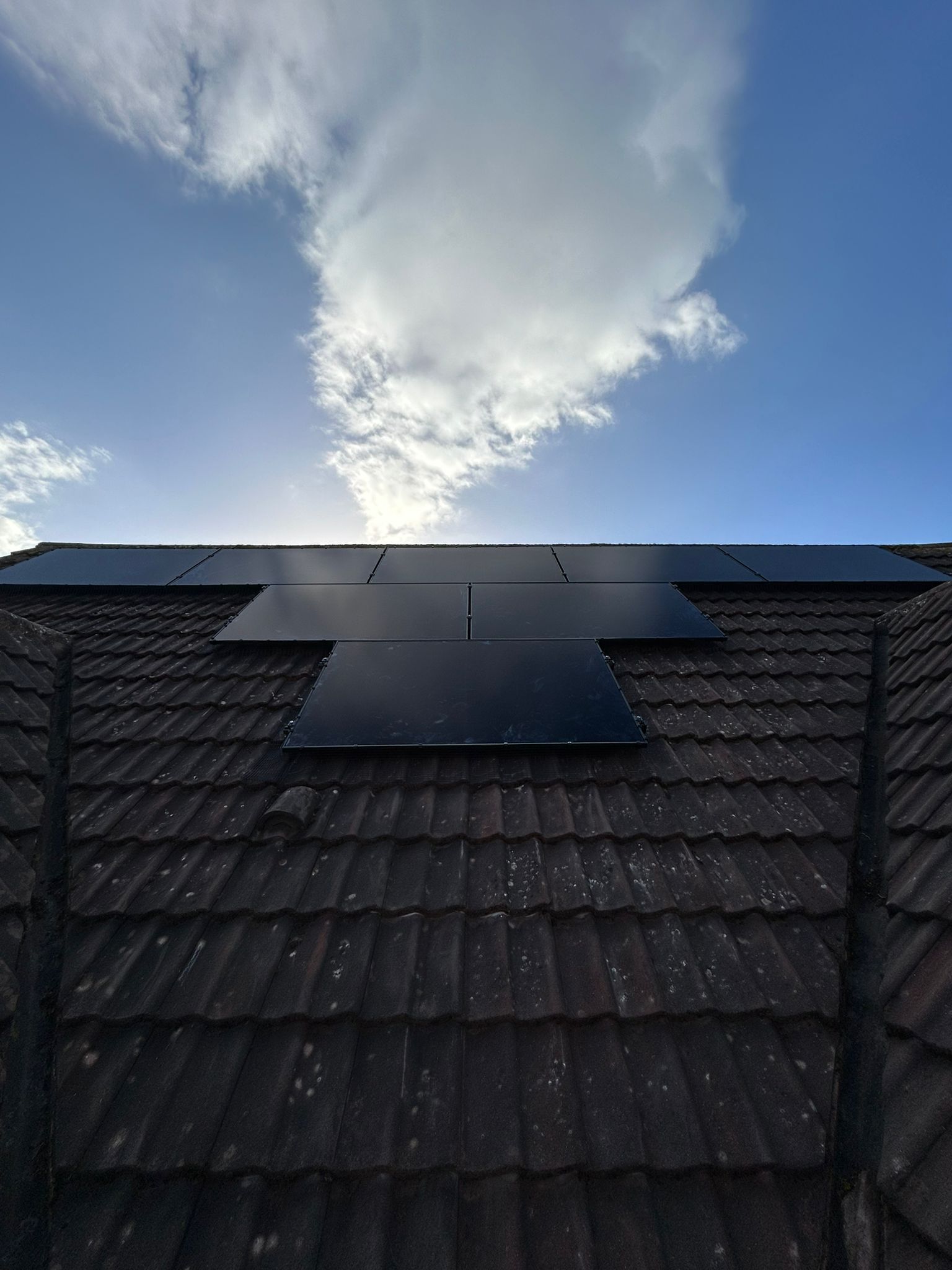 Solar array on dark tile roof Weston-super-Mare